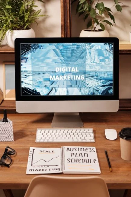 team-03 Wooden blocks spelling SEO on a laptop keyboard convey digital marketing concepts.